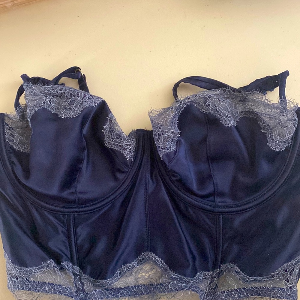 Dark blue color, with light blue lace around bust and the bottom